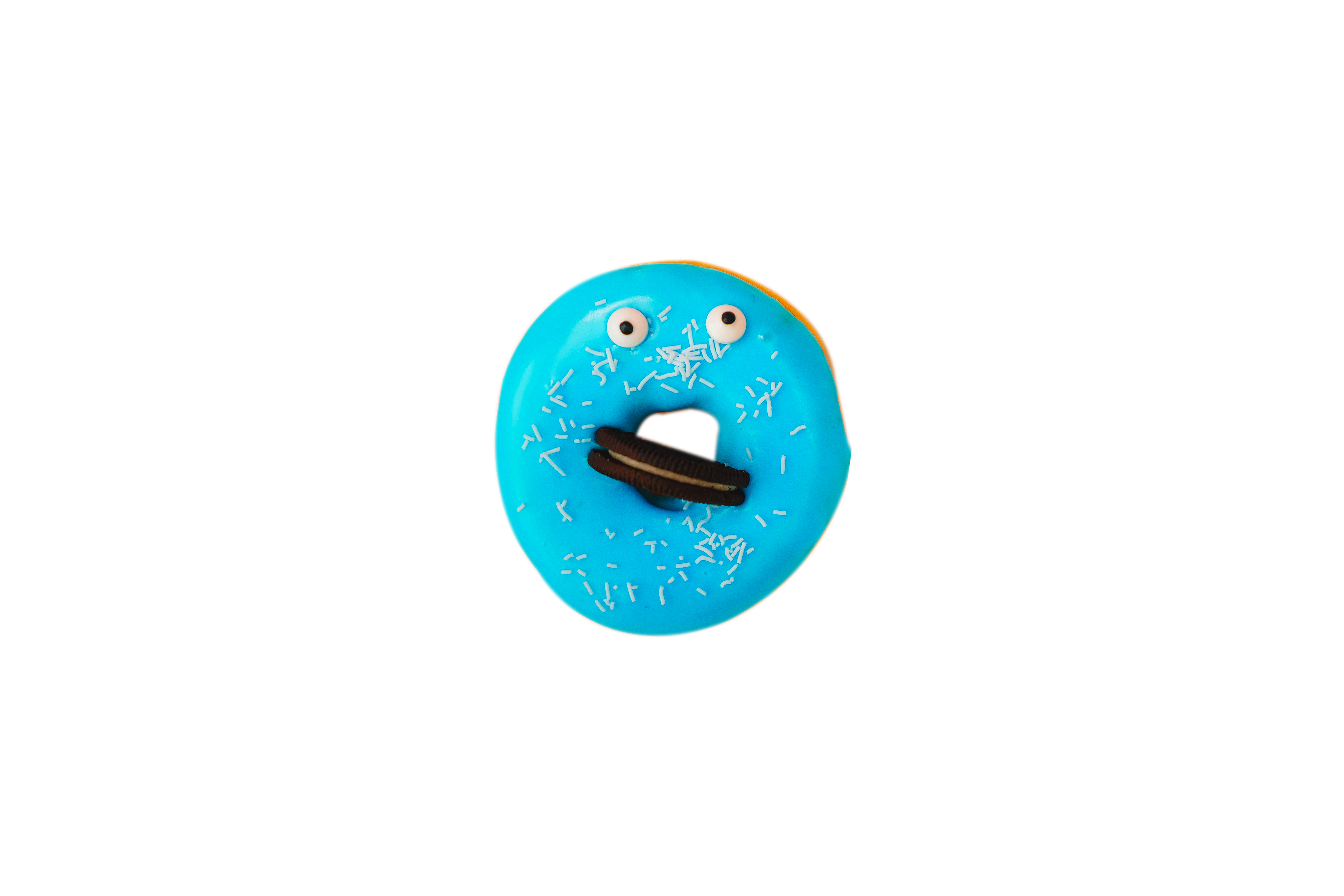 Colorful donuts with chocolate filling and sprinkles